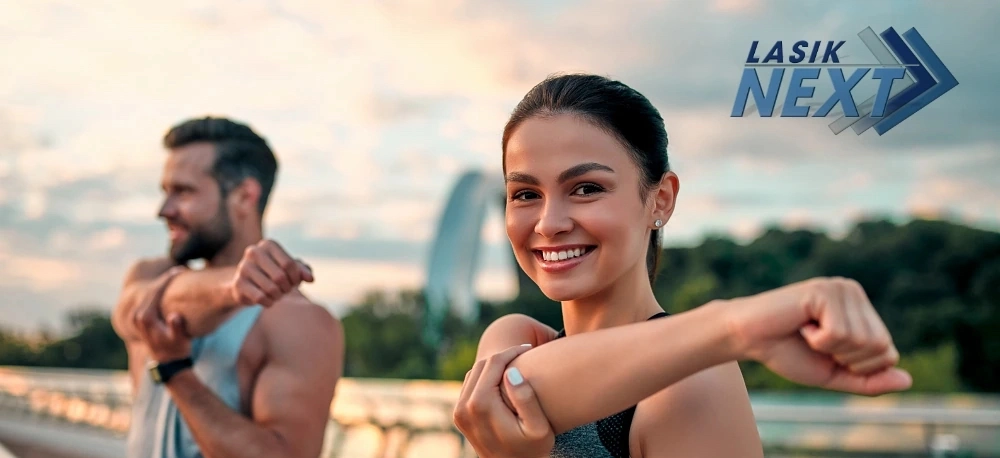 a photo of healthy man and woman stretching with a LASIK next graphic